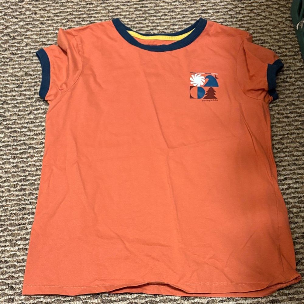 Women’s Patagonia size small T-Shirt with Blue Trim